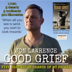 Promotional photo for the show. A photo of a white man with short brown hair, light facial hair and a green t-shirt standing against a blue sky. He has a slightly determined expression. The text reads "Jon Lawrence" and the subtitle "Good Grief: Five Deserts in Search of My Father".